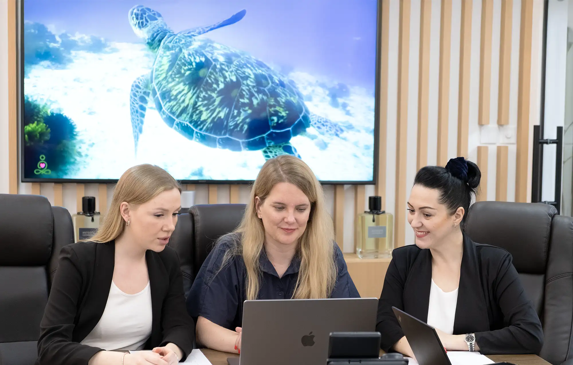 The West Consulting team reviewing a client's setup